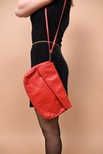 Load image into Gallery viewer, A person models the purse.
